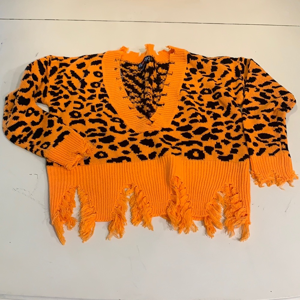 LU NYC Distressed Leopard Sweater